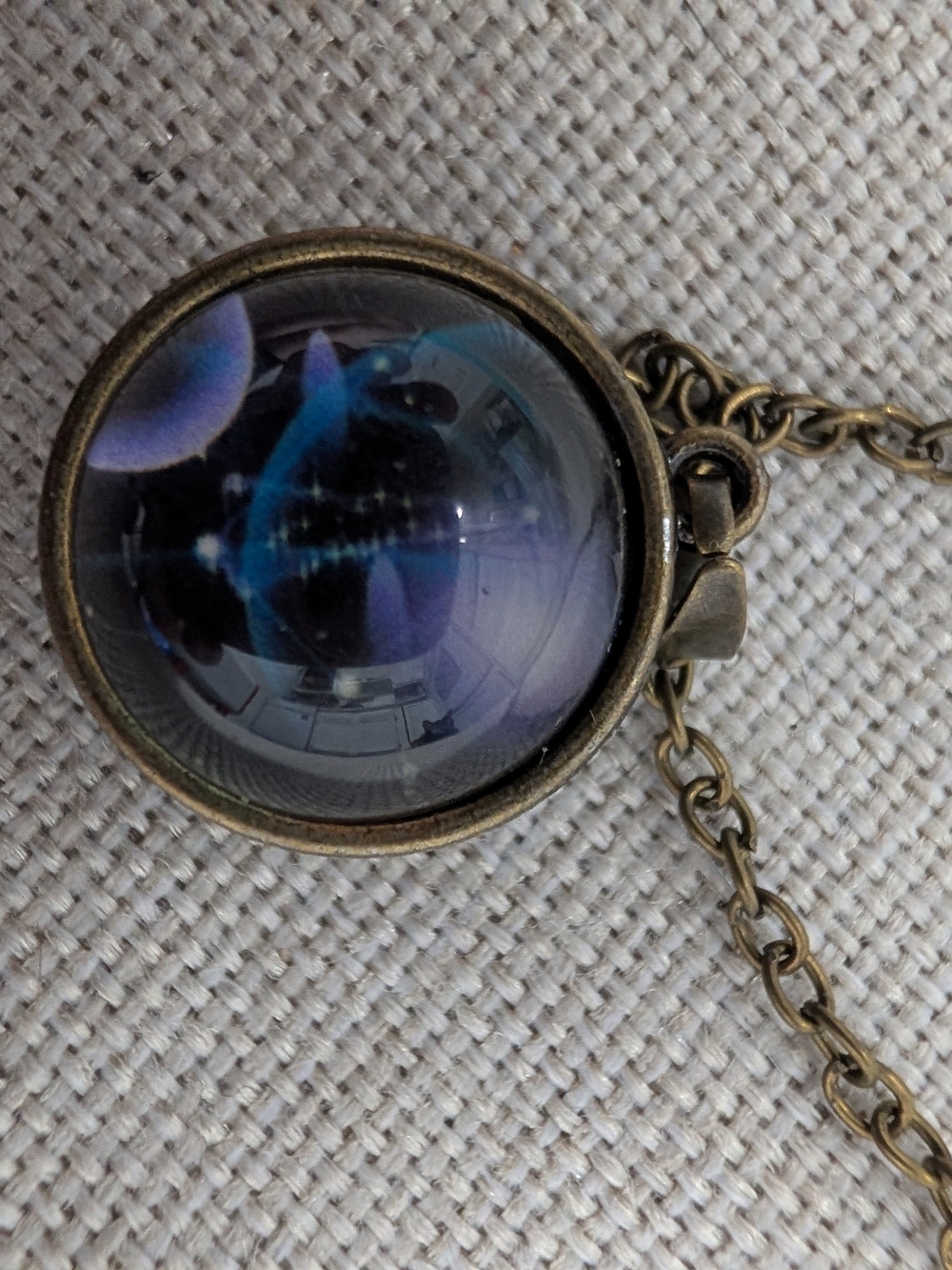 Bronze Glass Globe Pendant Necklace with Blue-Purple Accent